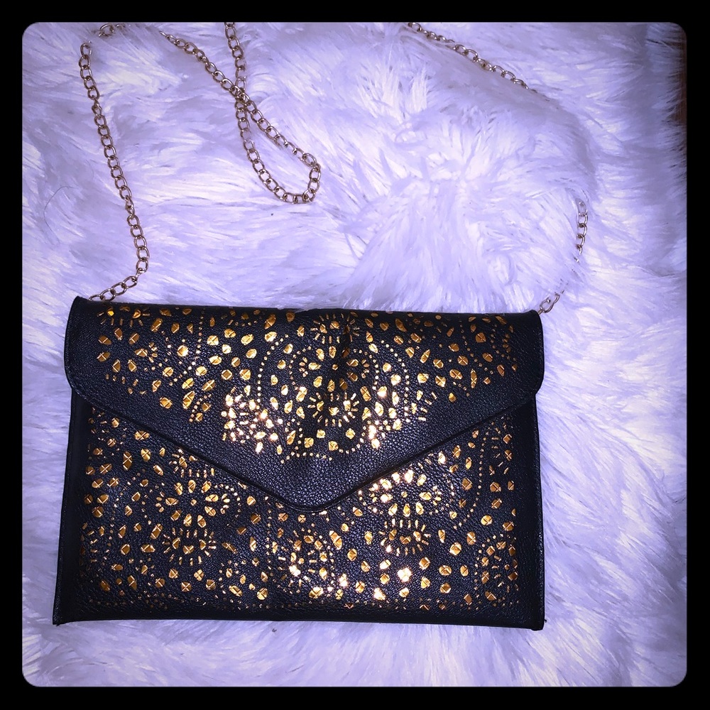 Black n gold clutch